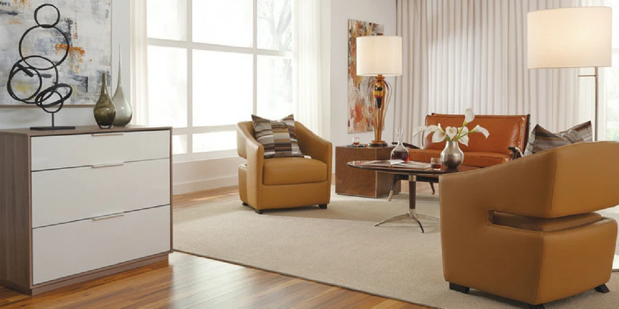 area rug in living room with brown furniture